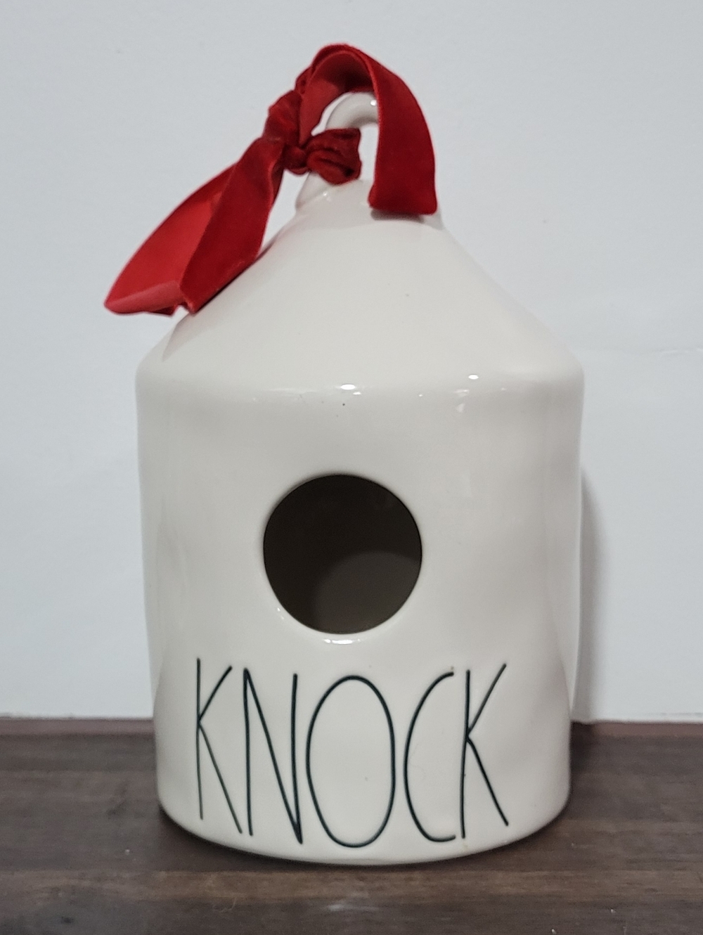 Rae Dunn white ceramic birdhouse with red bow